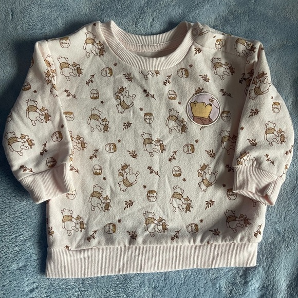 Disney Other - Disney Cream Sweatshirt with Bear Pattern